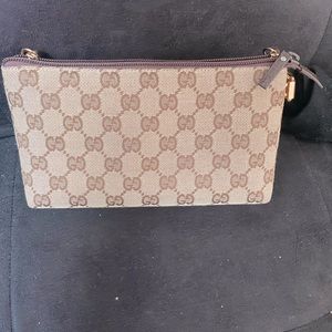 AUTHENTIC Gucci Monogram clutch with brand new unbranded adjustable strap.